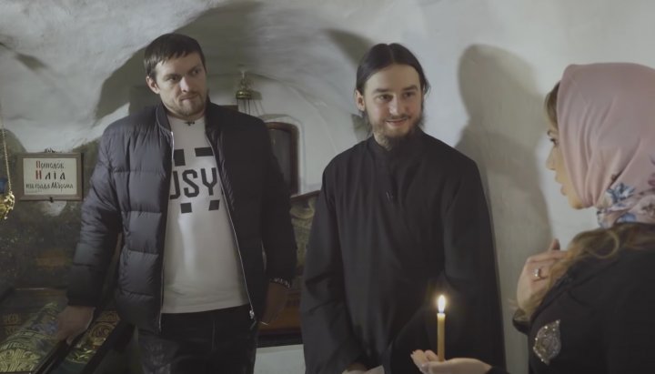 Alexander Usik in the caves of the Lavra. Photo: a screenshot of Oksana Marchenko's YouTube channel