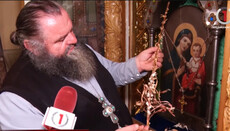 Dry lilies blooming near Theotokos Icon in Rakoshino Monastery of UOC