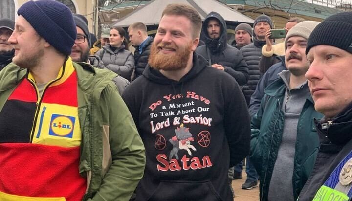 Activists with Satan on their T-shirts. Photo: news.church.ua